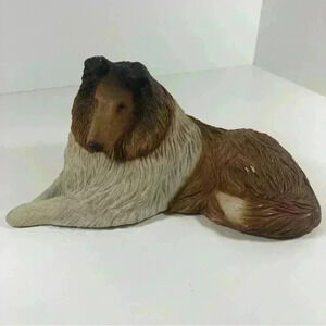 1984  Sandicast reclining collie sculpture